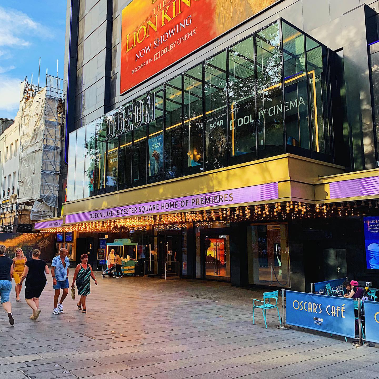 The exterior of modern cinema entrance with LED signage which contrasts to the previous signs in cinema history.