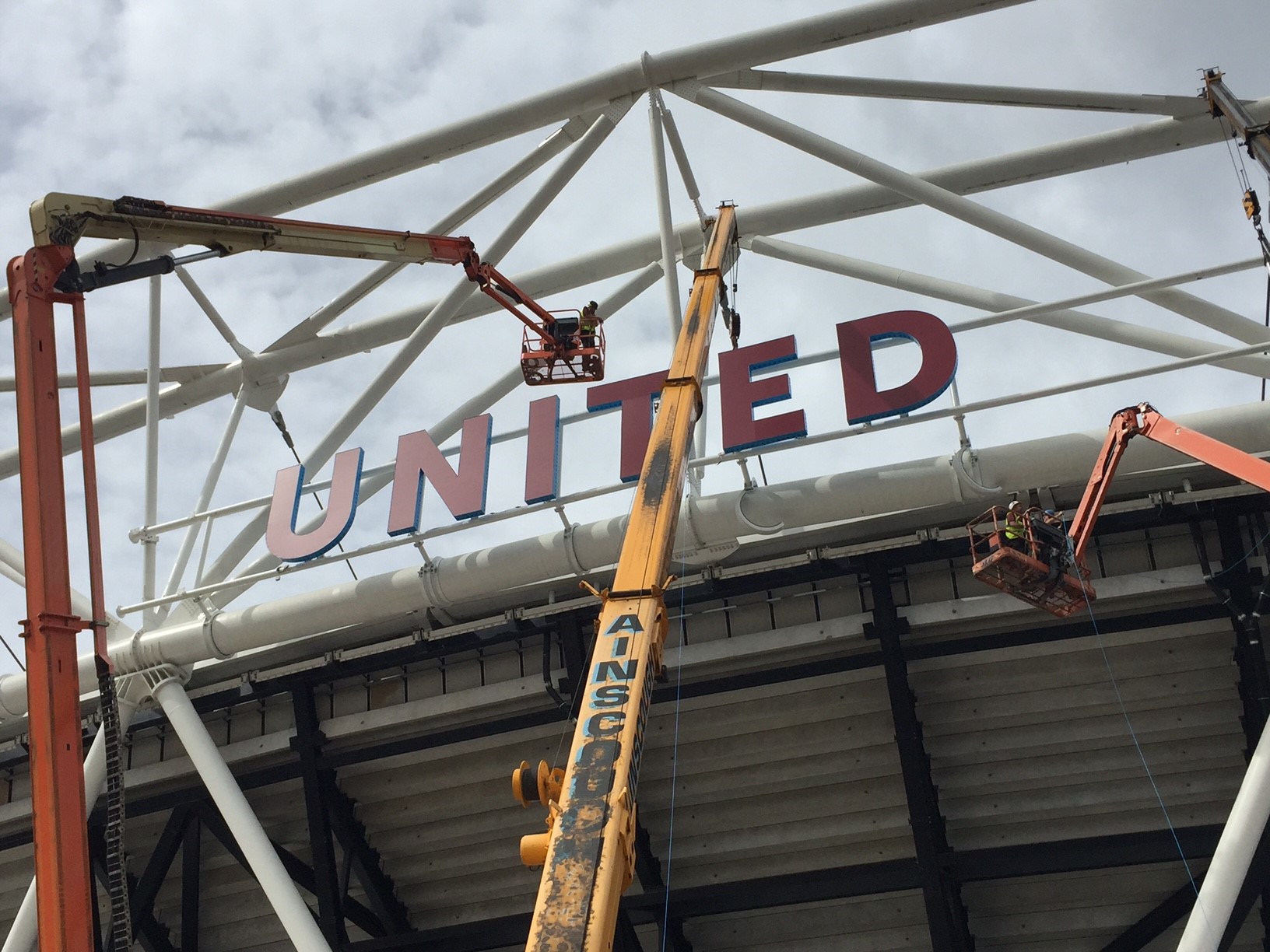 Commercial sign installation – Football stadium signage Commercial sign installation – Football stadium signage